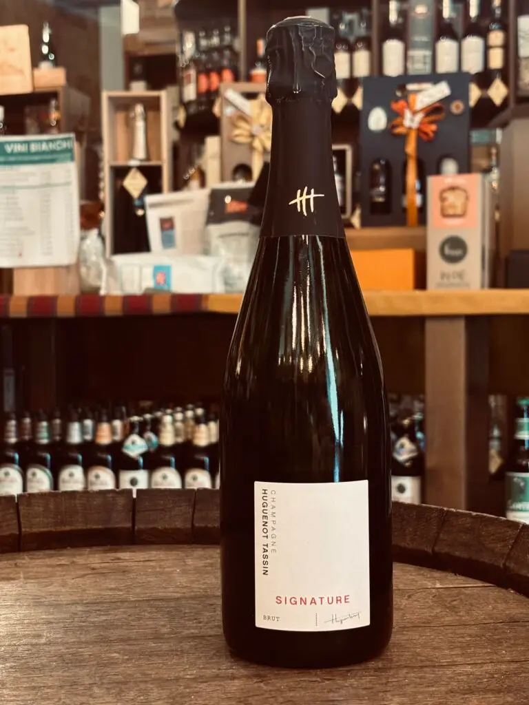 Signature Champagne 15 annate di pinot nero a Creazzo, enoteca artigianale